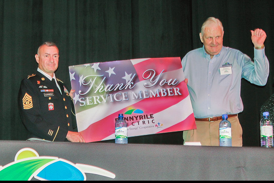 Sgt. Maj. Gabriel A. Espinosa Jr. receives a thank you note from Pennyrile Electric